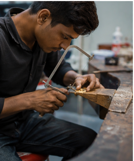 Karigar assembling jewellery components